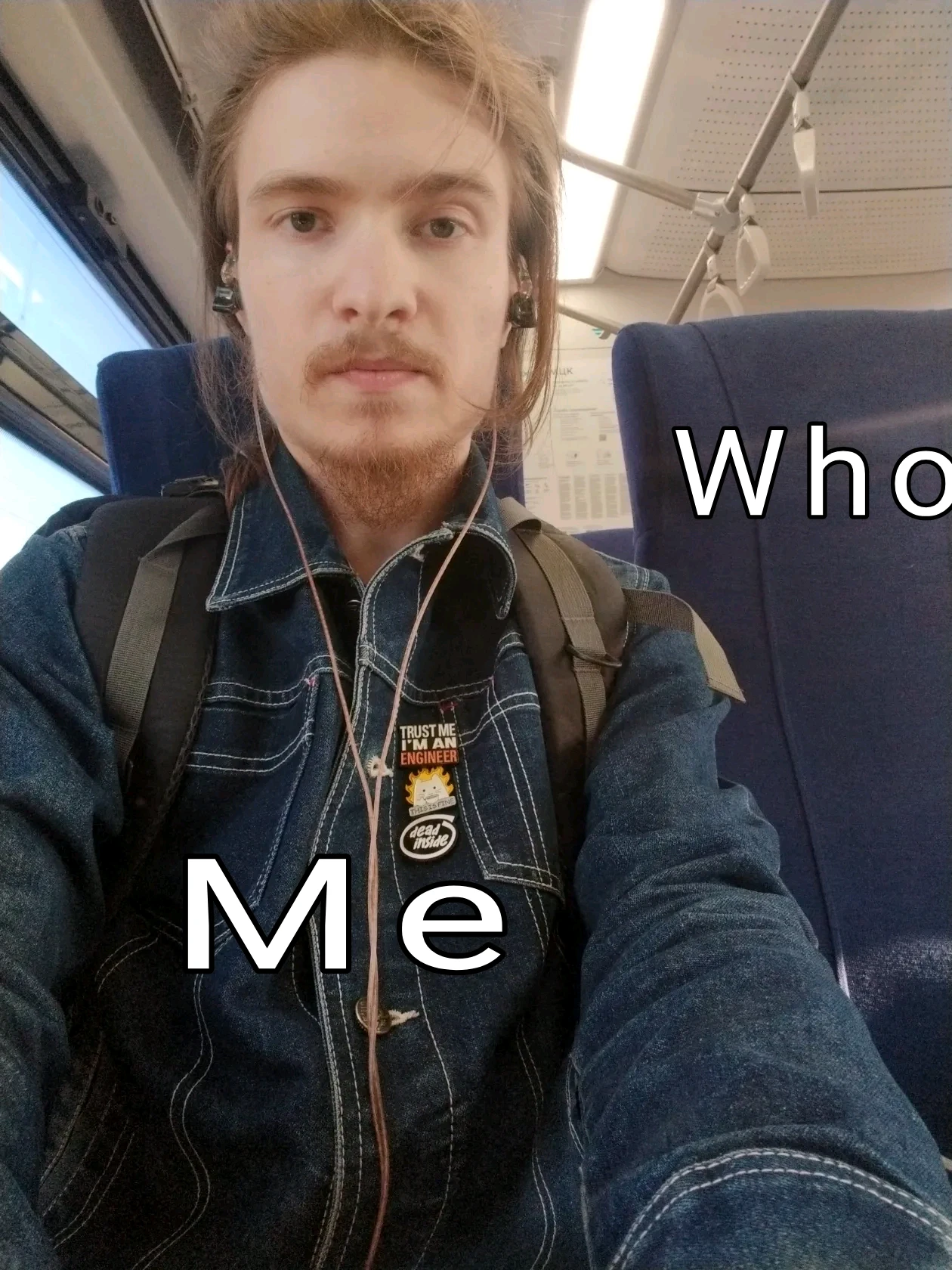 I look at camera, in the train